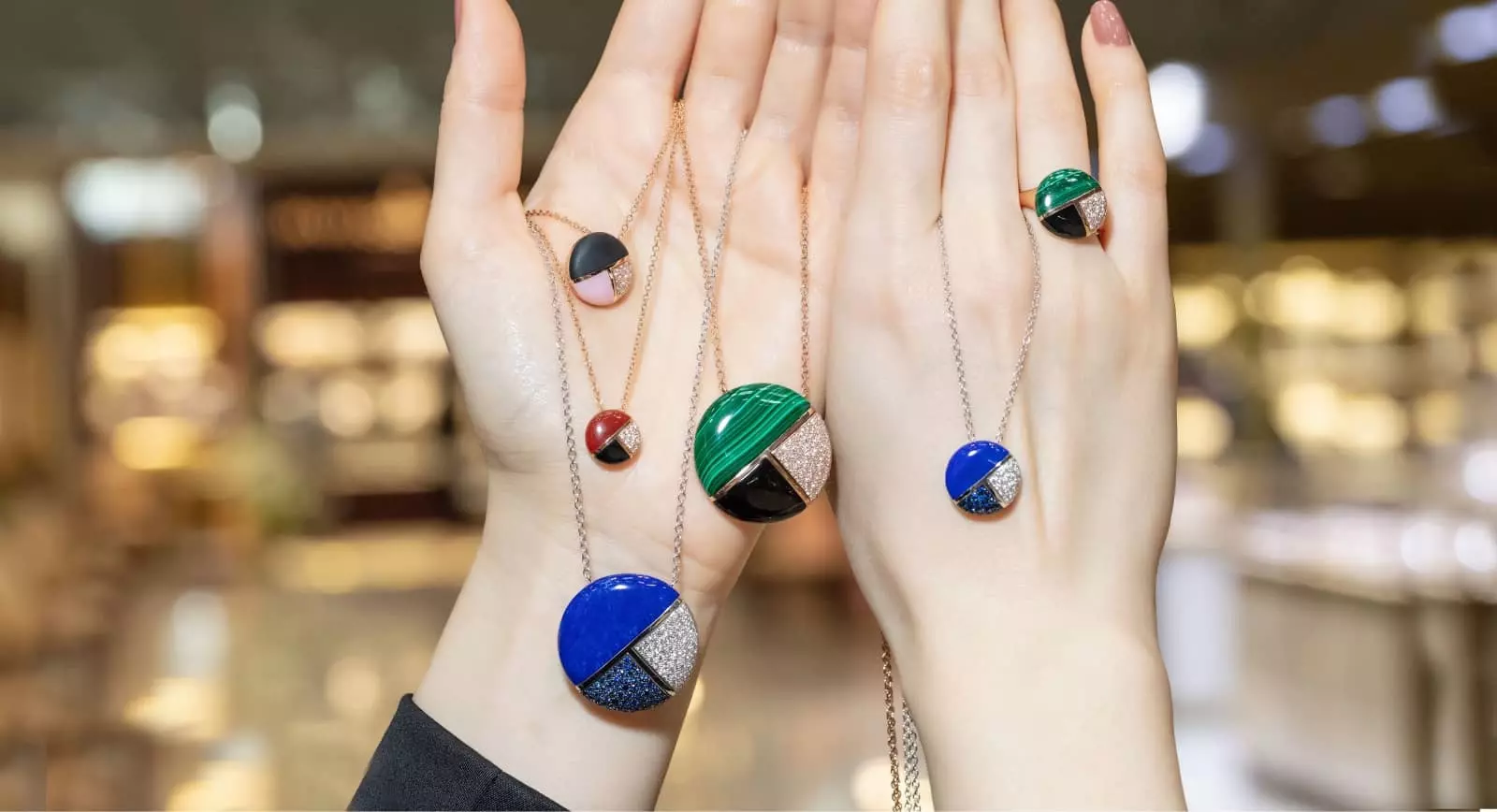Malachite, lapis lazuli and hardstone pendants by Luca Carati