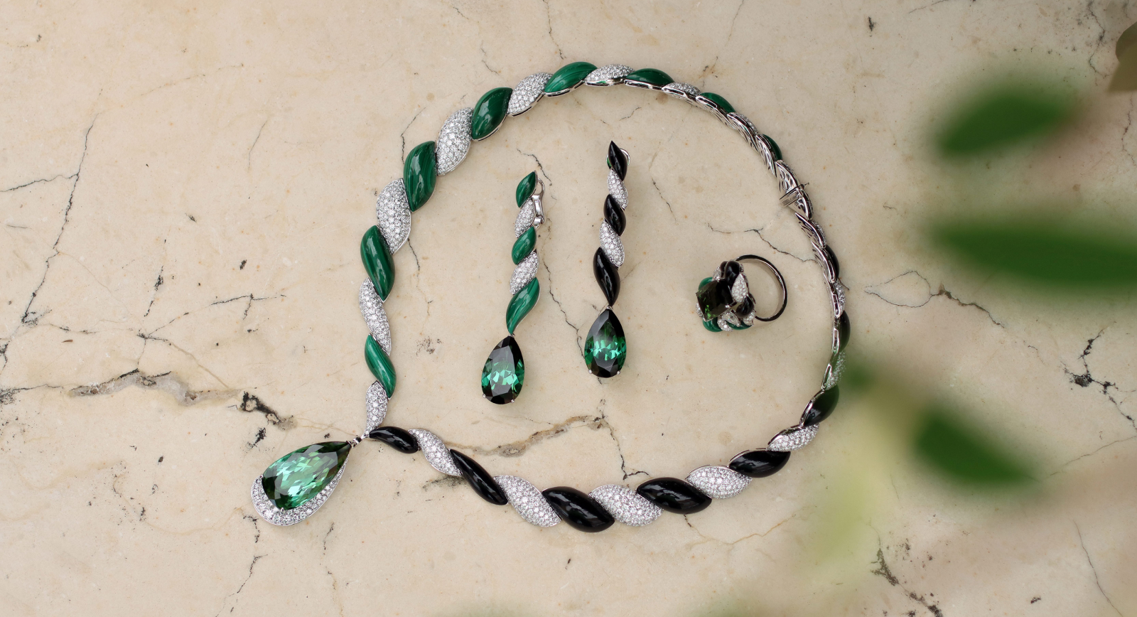 Pieces from the Maison J’OR Twist collection, including a necklace with 13.86 carats of diamonds, 29.57 carats of green tourmaline, malachite and onyx, set in 18k white gold 