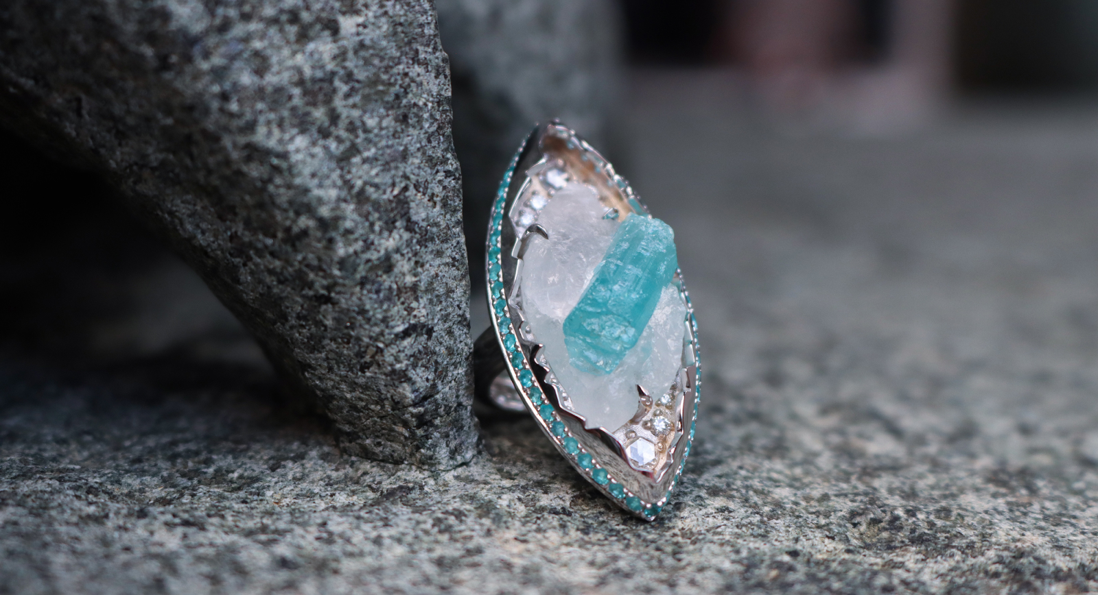 Susana Grau Batlle Evolution through Form ‘Form 1’ ring with a 19.05 carat Paraiba tourmaline in its quartz matrix, further Paraiba tourmalines, brilliant-cut diamonds and rose-cut diamonds set in 18k white gold and platinum, part of the A Trilogy of Evolution High Jewellery collection