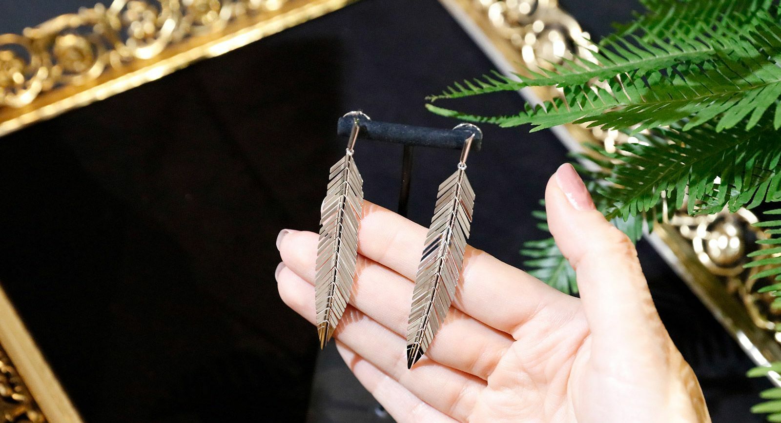 CADAR feather earrings from the Second Skin collection
