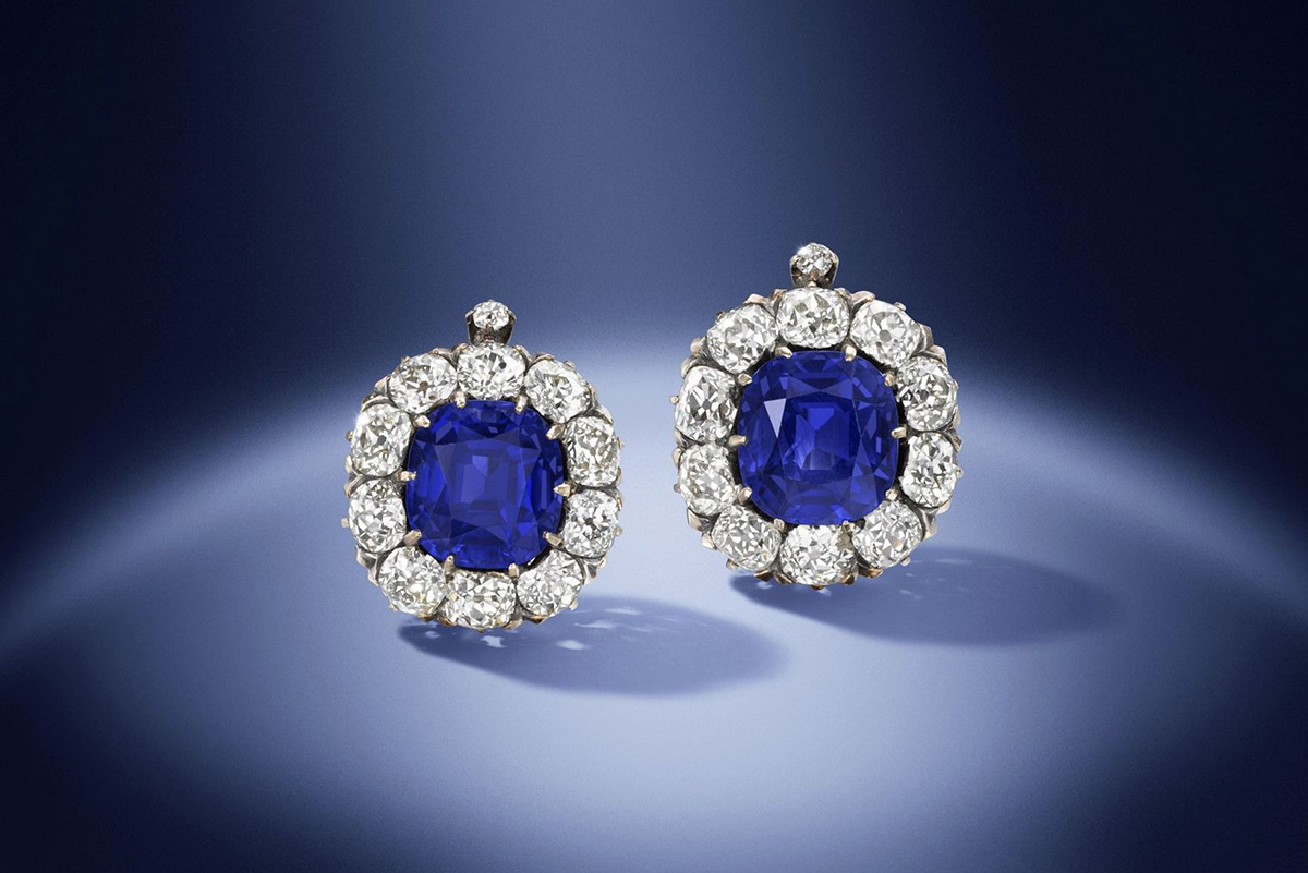 A pair of late 19th century 8.97 and 8.93 carats Kashmir sapphire and diamond cluster earrings