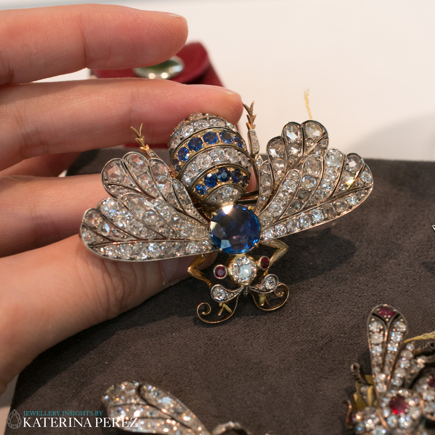 Sapphire and Diamond Bee Brooch, with ruby eyes, circa Early 20th Century. Total 3.55 carats