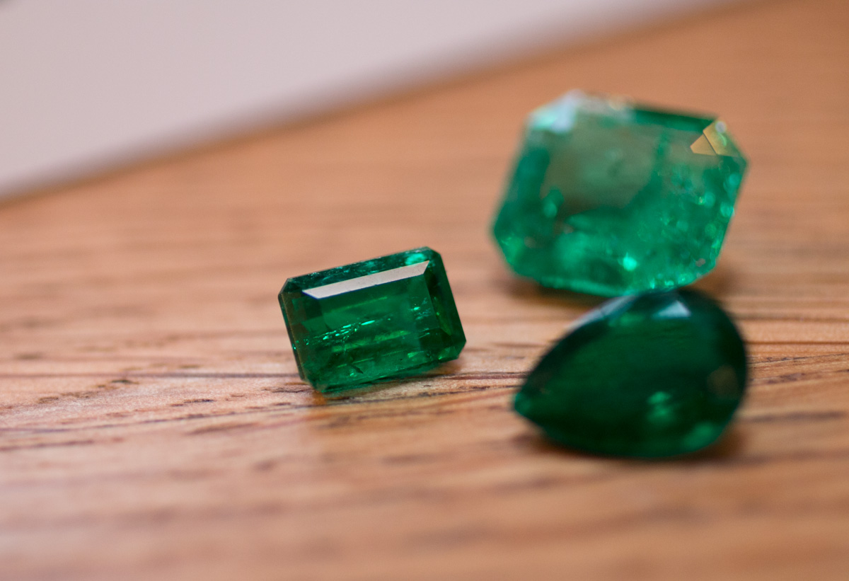 Emerald with numerous internal fissures