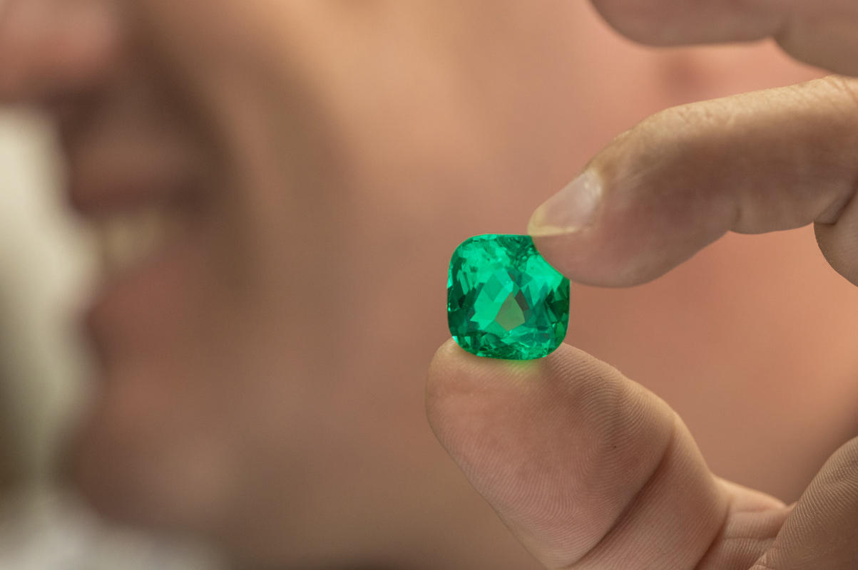 International Emerald Exchange cut and polished Colombian emerald of cushion shape. Photo credit: Juan Cristobal Cobo