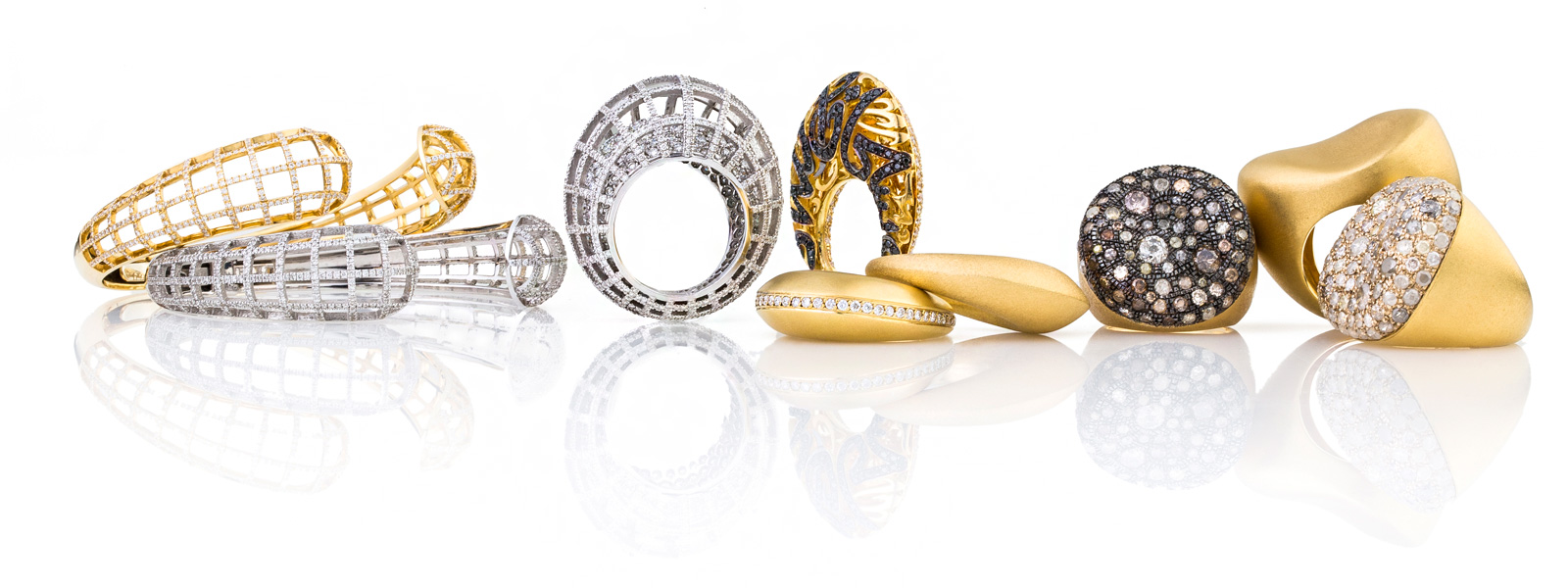 Nada G rings and bracelets in yellow and white gold with diamonds