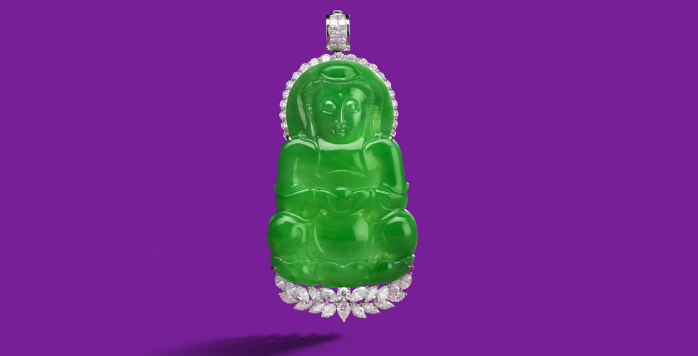 A jadeite and diamond ‘Guanyin’ pendant with fine translucent carved jadeite (no resin). ‘Guanyin’ of a rich bright green colour is meditating on a lotus throne, embellished by marquise, pear and brilliant-cut diamonds of approximately 7.60 carats total. Est. $ 350,000 – $ 450,000