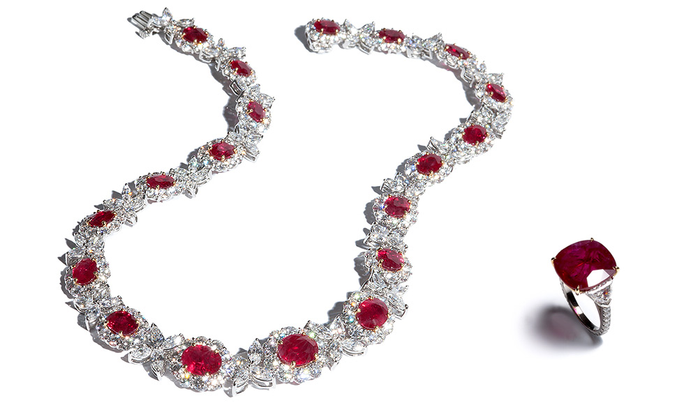 LEFT: Ruby Necklace with 19 oval “pigeon’s blood” Burma rubies weighing 34 carats total and 41 carats of colorless diamonds; RIGHT: Ruby Ring with a 10 carat cushion Mozambique ruby flanked by epaulet diamonds with diamond mircopave on the shank