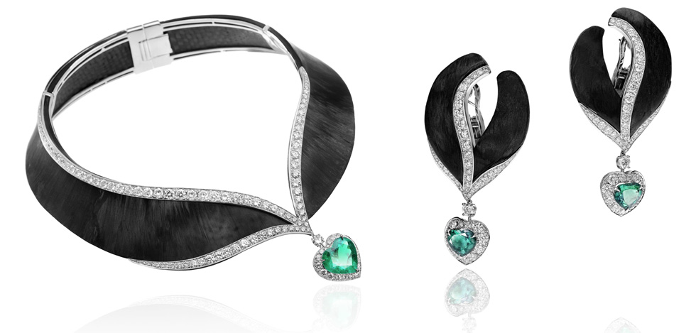 Carbon fiber, heart-shaped emeralds and diamonds set in white gold by Adler