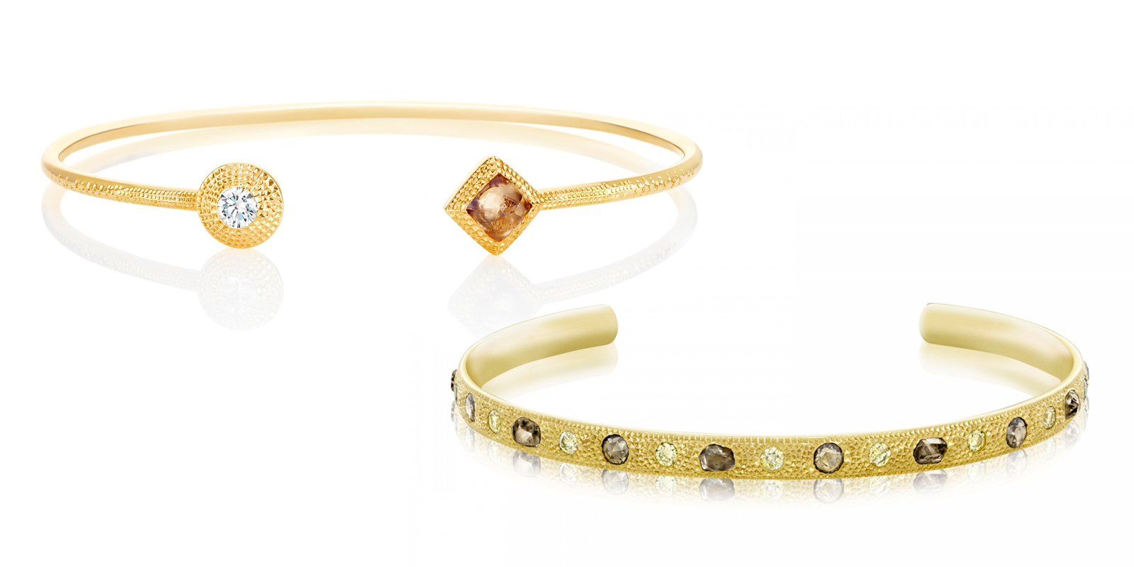 De Beers Talisman collection open bangles in yellow gold with rough and faceted diamonds