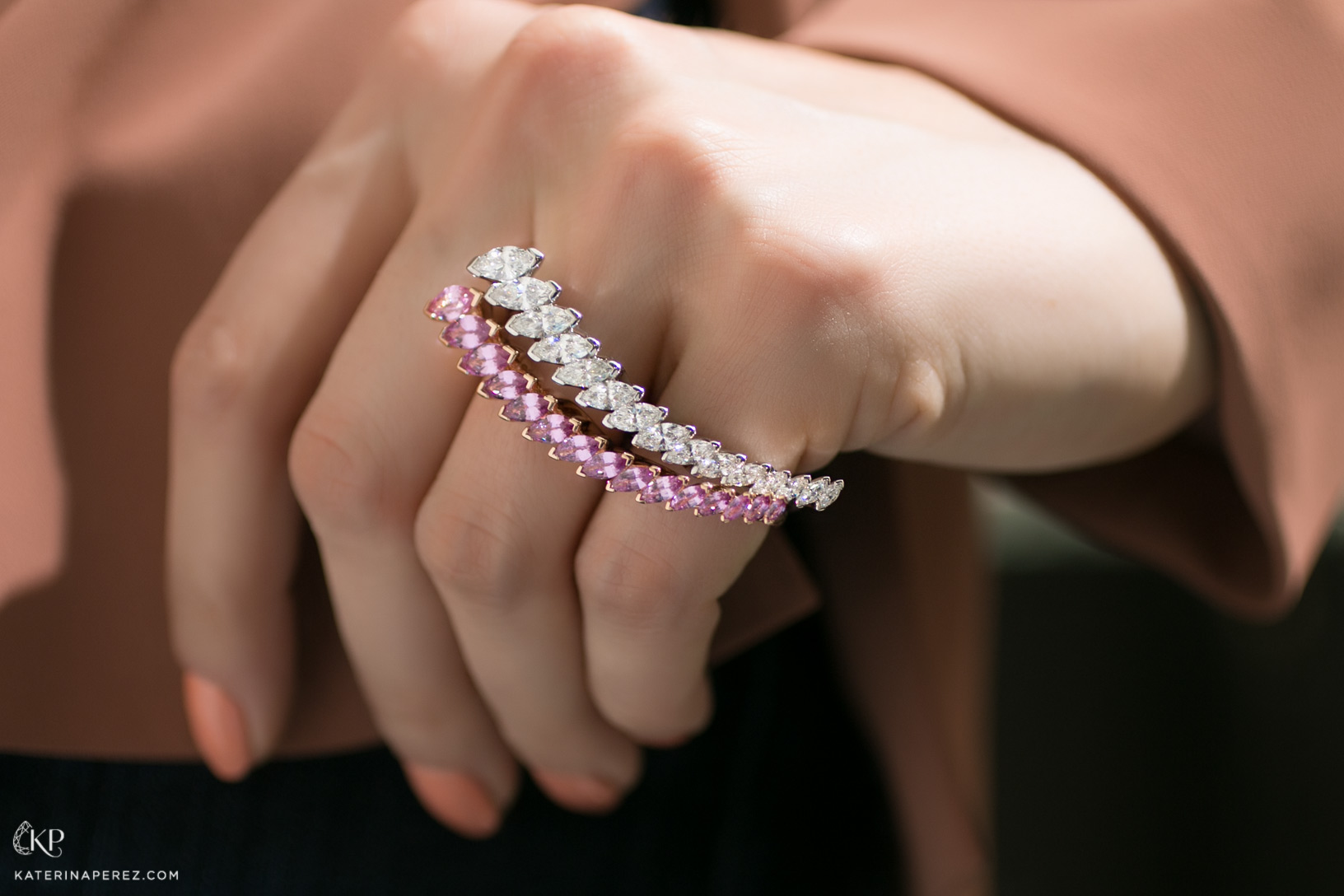 Baenteli 'Cascades' double finger rings in pink sapphires and diamonds