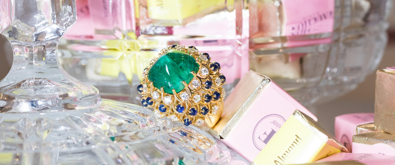 Veschetti ring with a sugar loaf emerald, sapphires and diamonds set in yellow gold. Photo by Simon Martner for katerinaperez.com