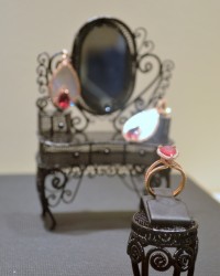 Inbar rose gold ring with pave diamonds and a pear-shape ruby