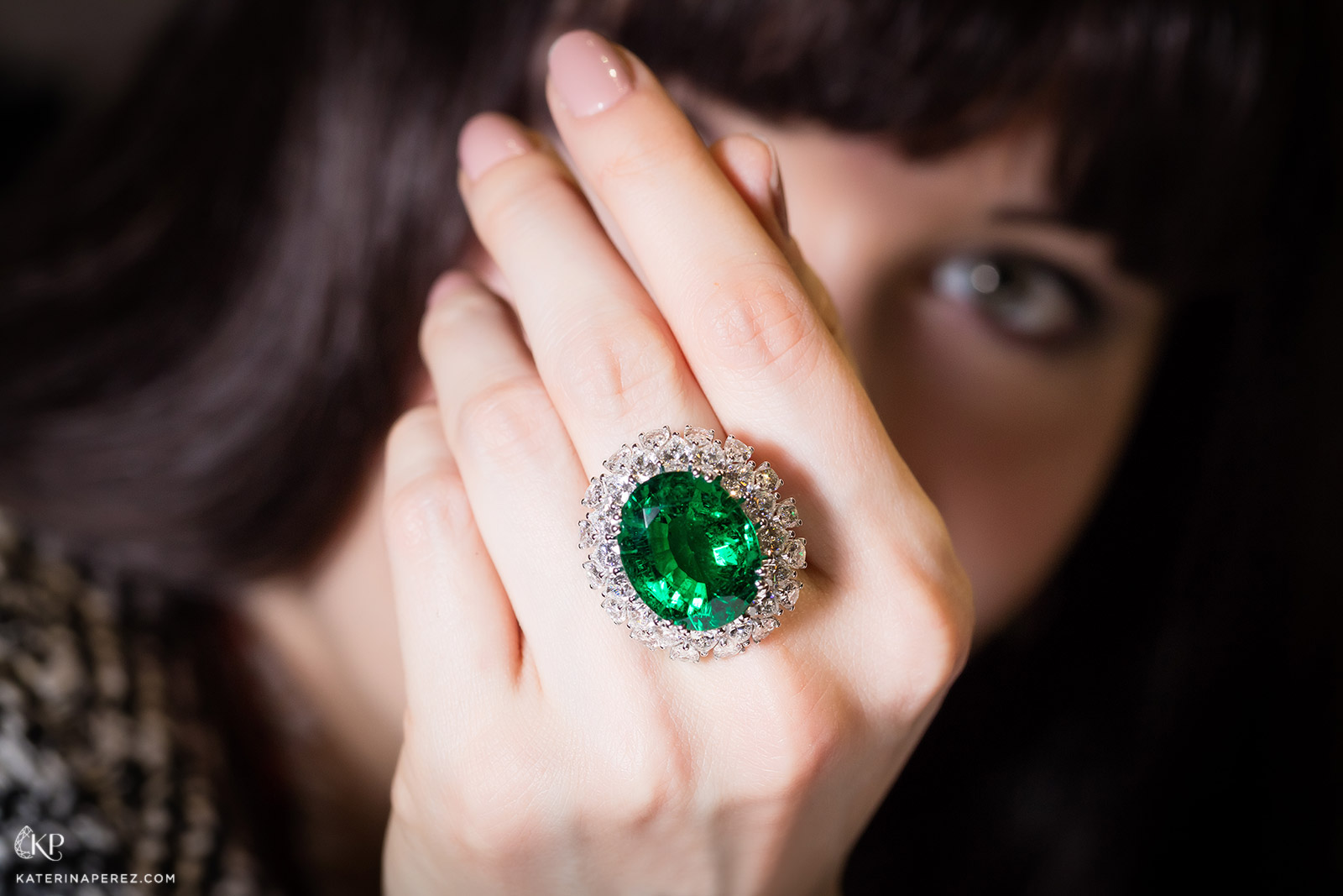 Picchiotti bombé ring with 19ct Zambian emerald and pear cut diamonds