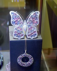Butterfly with rose cut sapphires and round brilliant diamonds set in white gold by Fraleoni