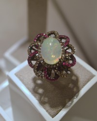 D.Donna cocktail ring with an oval cabochon opal, champagne diamonds and pink sapphires
