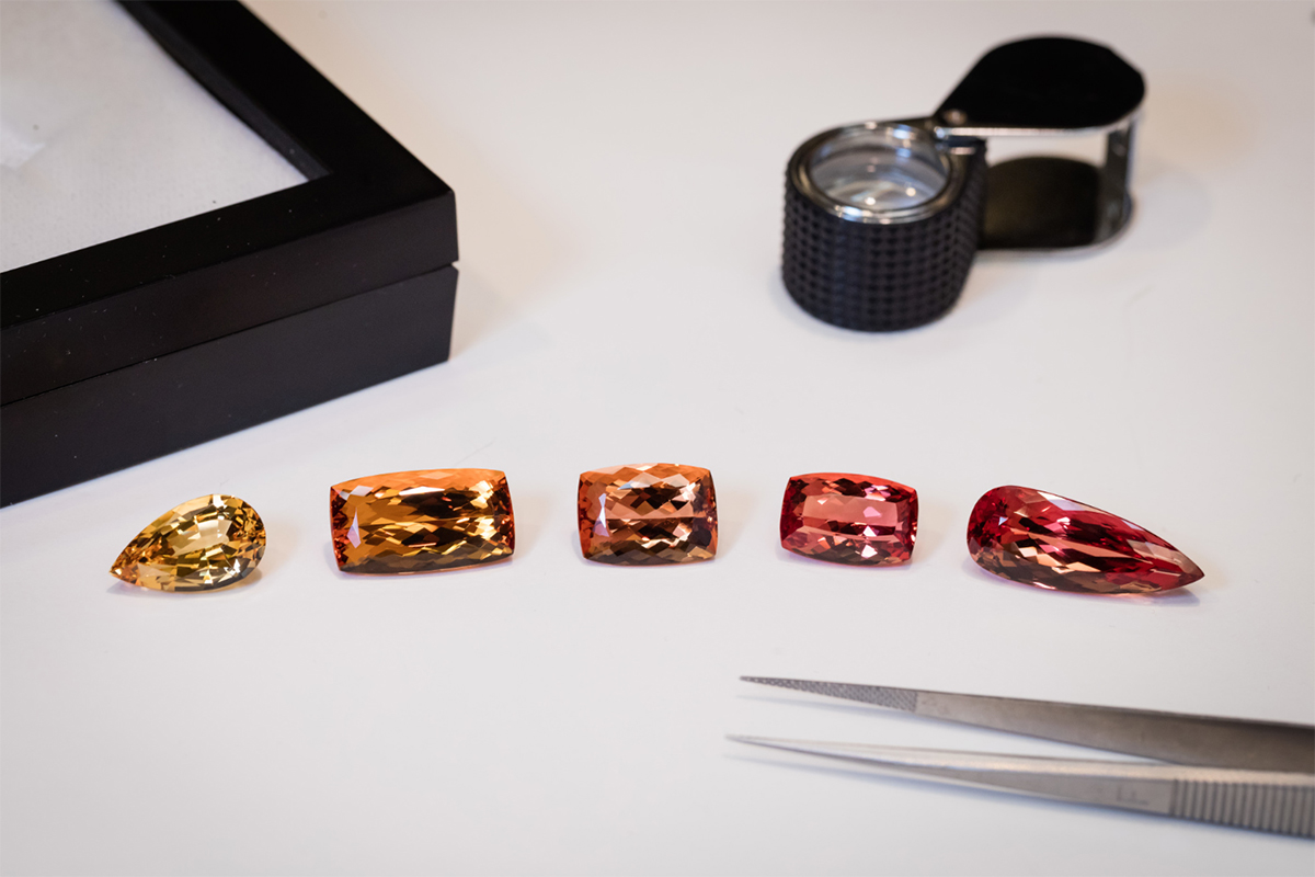 The quality scale of Imperial topaz: from yellow, golden, pinkish-orange, orange-red, to pinkish-red at Constantin Wild