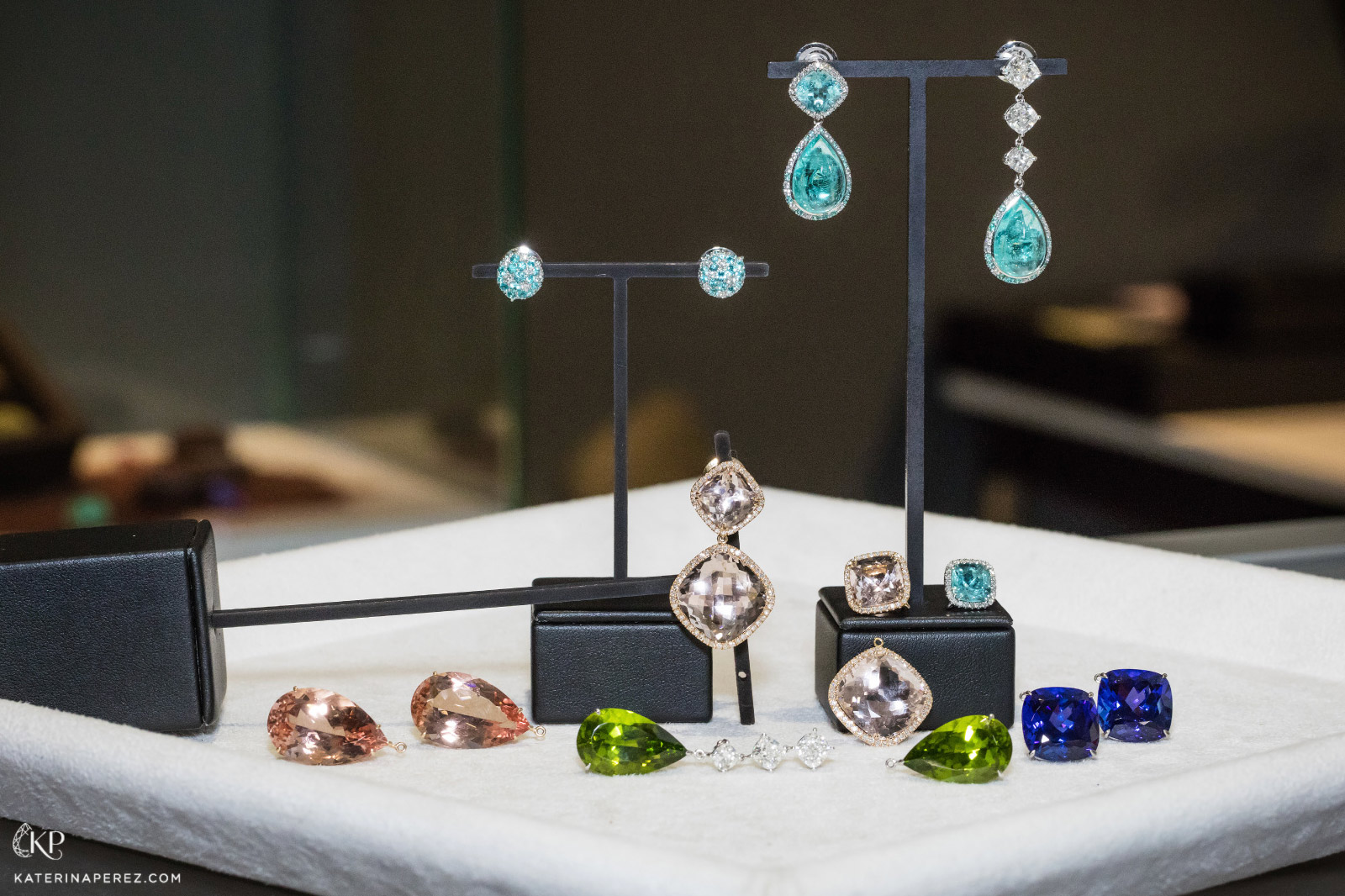 A selection of Doris Hangartner gemstone jewellery in Paraiba tourmaline, morganite, peridot, and tanzanite 