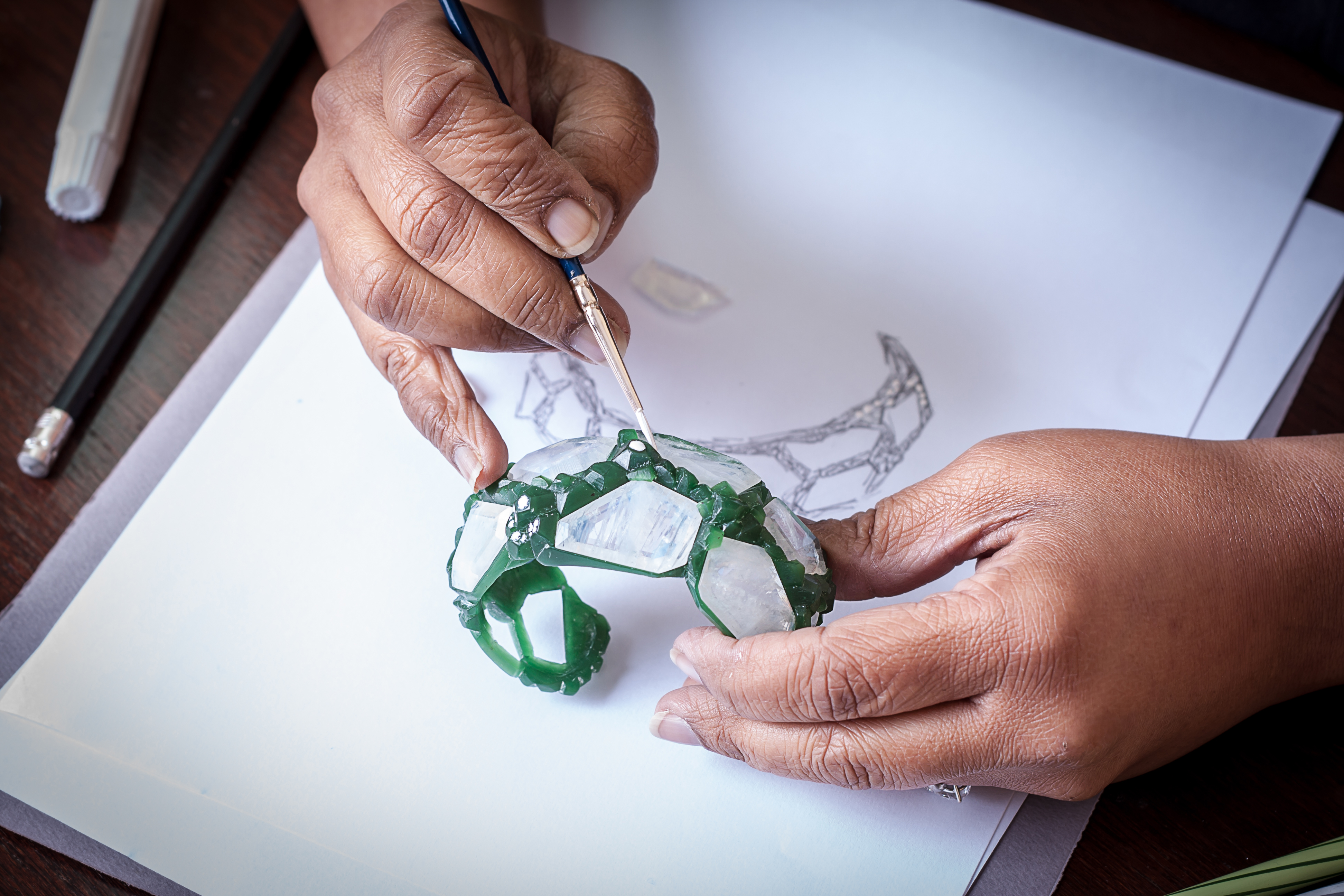 Neha Dani working on the 'Aialik' cuff from the 'Glacier' collection wax model