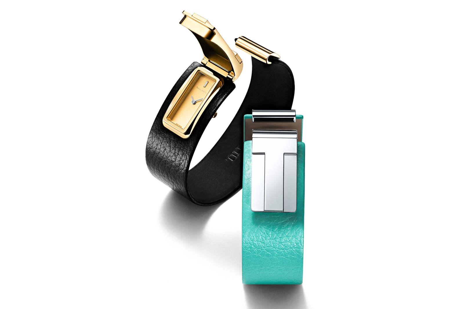 Tiffany & Co. 'Tiffany T' cuff watches in yellow gold and silver