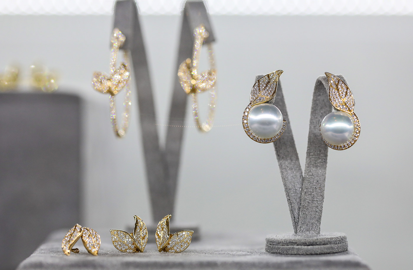 Nadine Aysoy Feuille collection earrings and ea-cuffs in yellow gold, pearls and diamonds