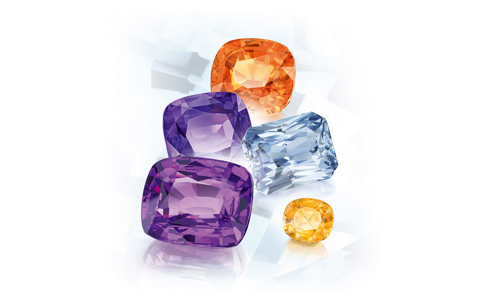 A selection of fancy coloured sapphires in a variety of cuts from Constanin Wild