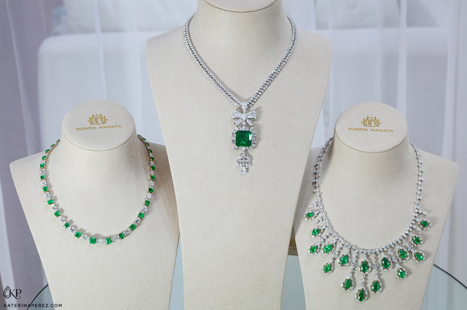 Sunita Nahata 'Regalia' collection (from left to right) single strand necklace with 19.70ct Colombian emeralds and 16.20ct diamonds, ‘Star’ necklace with 22.31ct Colombian Muzo emerald and 9.53ct diamonds, and long drop necklace with 27.16ct Colombian emeralds and 32.21ct diamonds, all in 18k white gold