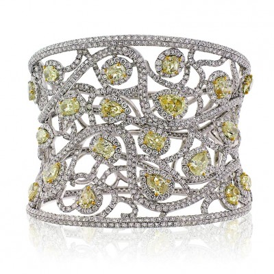 A magnificent Avakian cuff bracelet set with fancy yellow diamonds and white diamonds