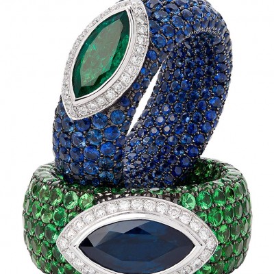 A striking pair of signature Avakian rings set with emeralds,sapphires and diamonds