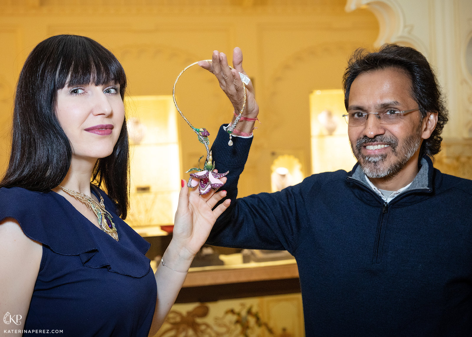 Katerina Perez and Anup Bohra of Masterstrokes with the 'Aphrodite' necklace featuring 158.55ct of pink conch shell, central 4.41ct ruby and accenting rubies, emeralds, tsavorites and diamonds in champlevé enamel