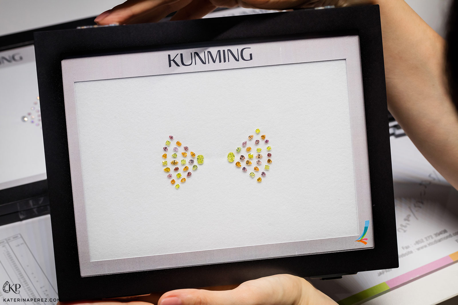 Kunming Diamonds set of yellow, pink and orange diamonds. Photo by Simon Martner