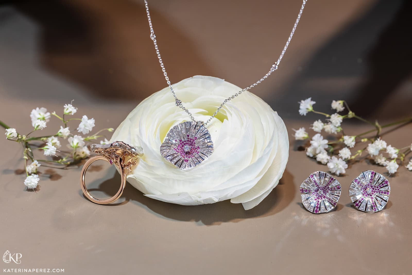 Stenzhorn 'Belle' collection ring, pendant and earrings with colourless diamonds and pink sapphires in 18k rose and white gold