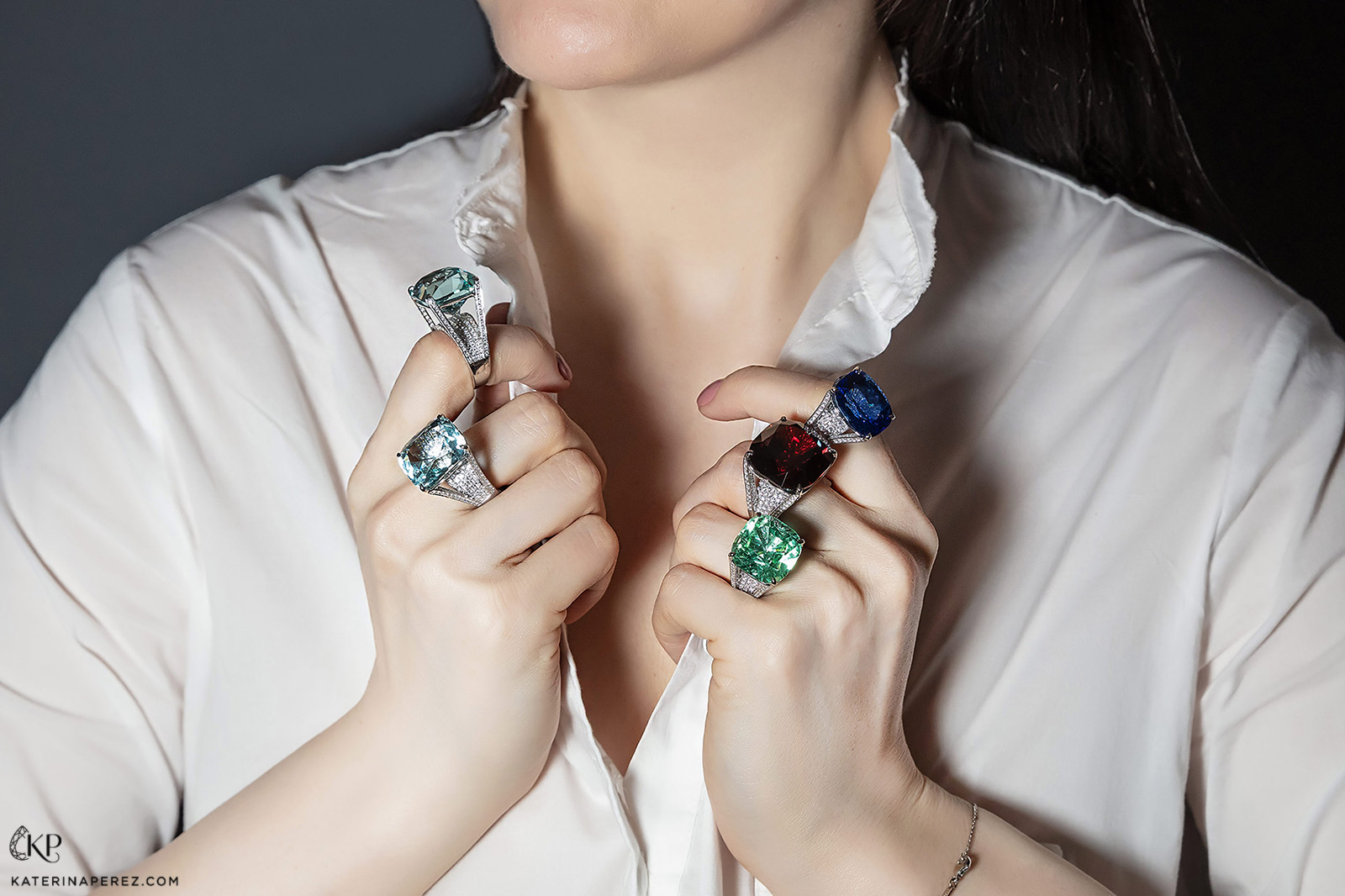 Alexander Laut 'Infinite Kiss' collection rings with 28ct and 39ct aquamarines, 24ct Burmese sapphire, 52ct spessartite garnet, 27ct tourmaline, all with diamonds 
