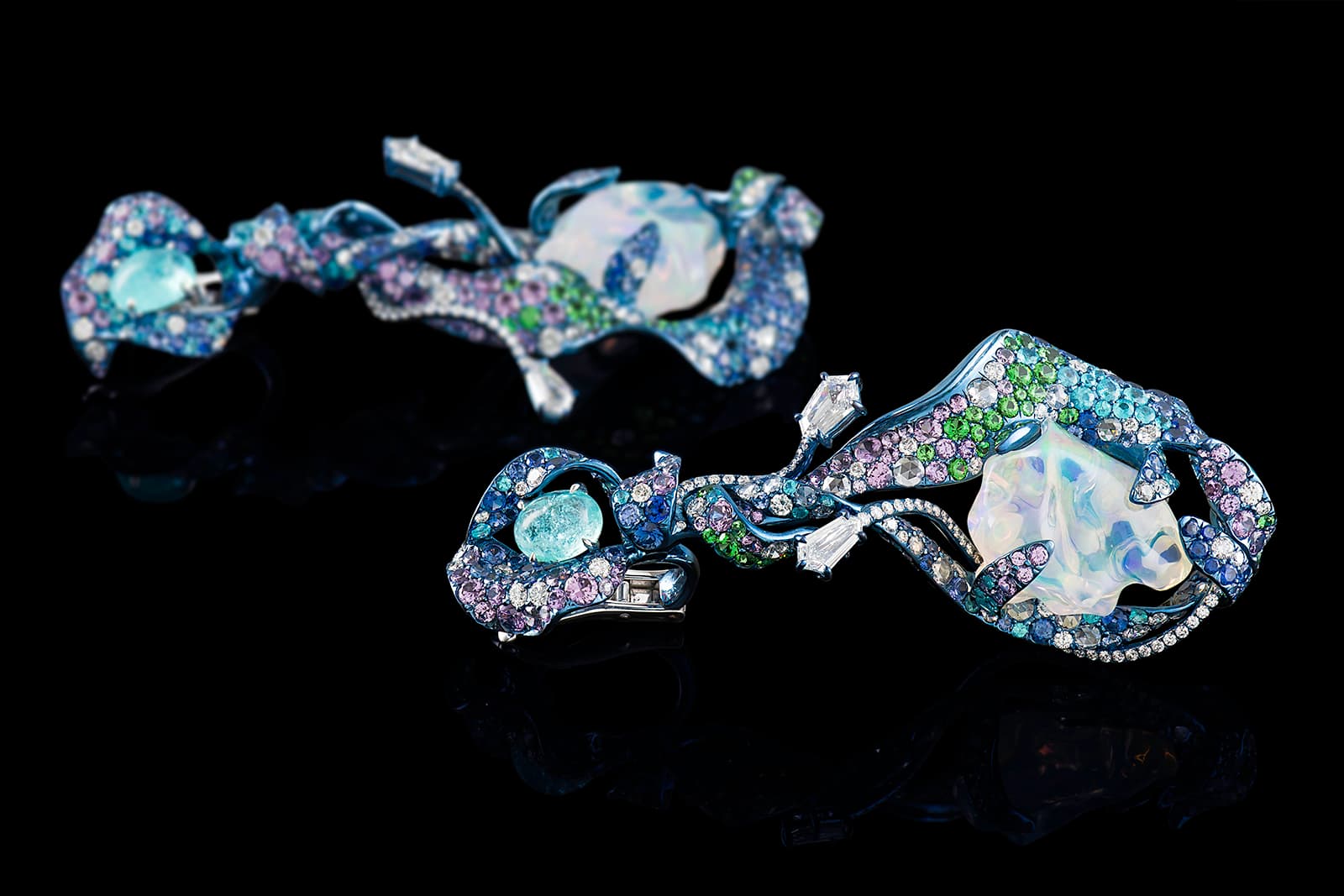 Neha Dani 'Shristi' collection 'Ridhaya' earrings with water opal, diamonds, Paraiba tourmalines, blue and purple sapphires and tsavorite garnets in titanium 