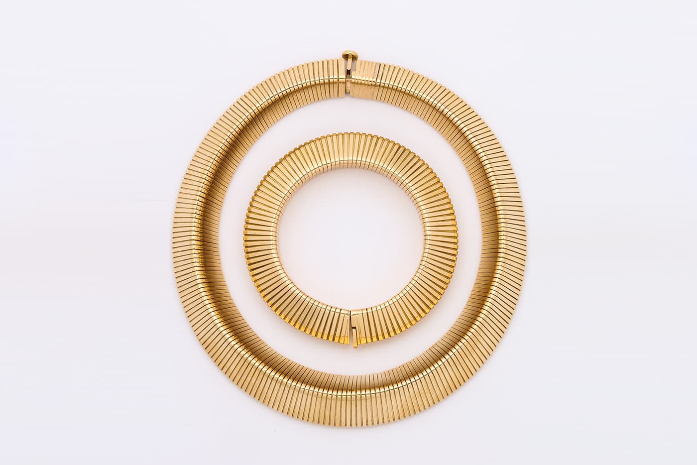Cartier bracelet and necklace in yellow gold offered by A La Vieille Russie
