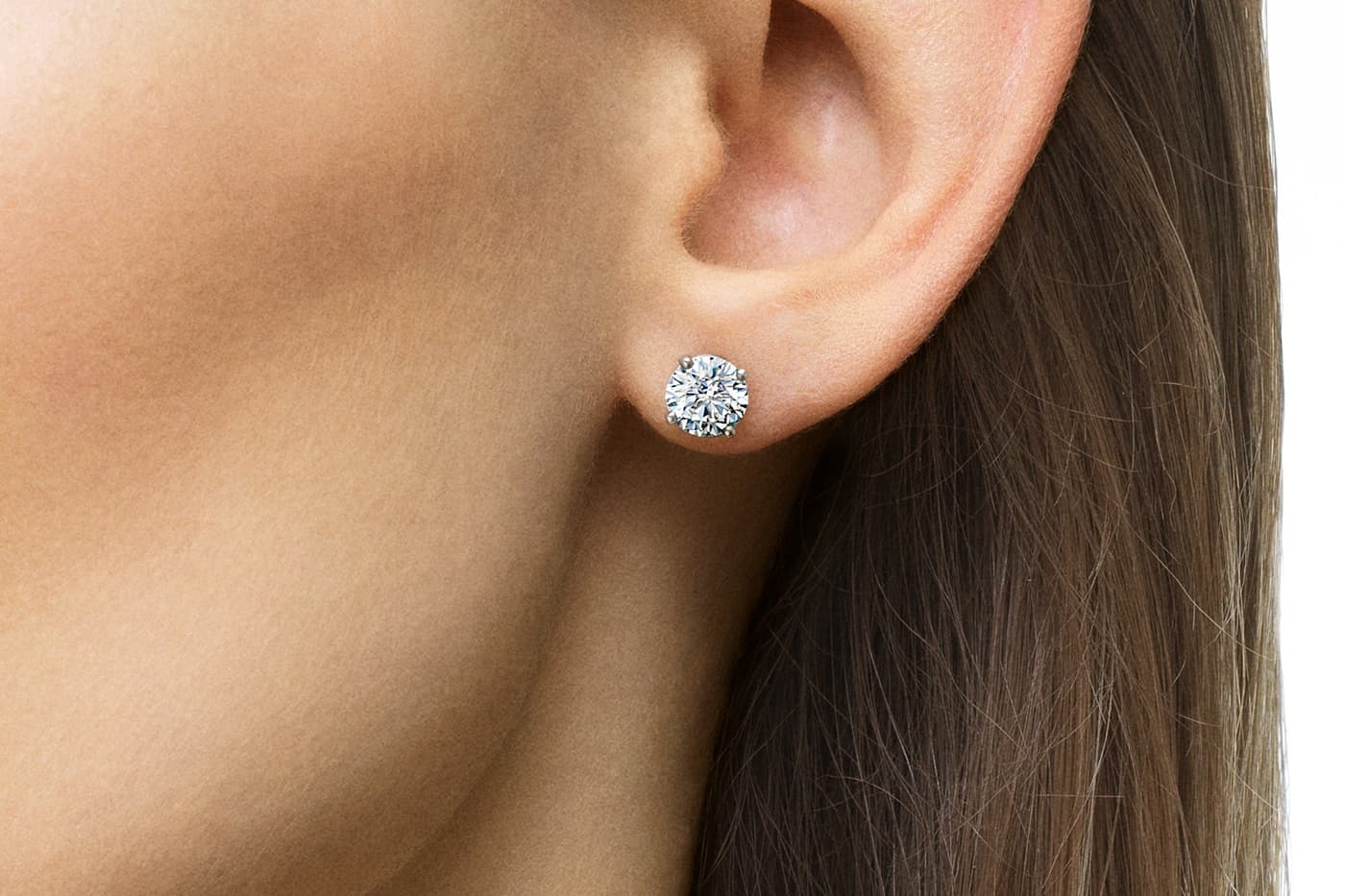 De Beers 'Classic' stud earrings with diamonds in white gold