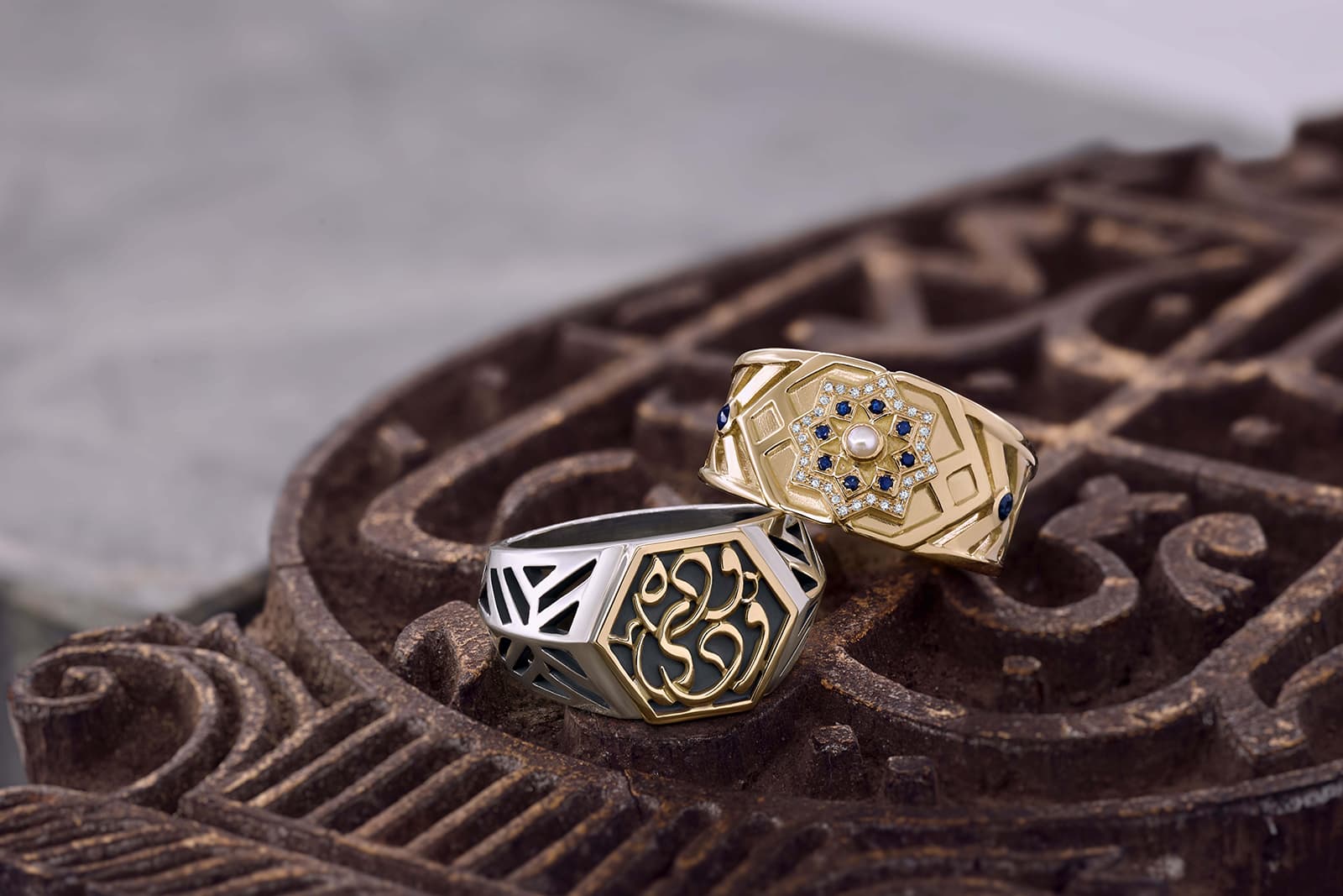 Azza Fahmy 'Mamluk' collection ‘Qalawun’ ring with diamonds, sapphires and pearls, and the  ‘Minaret’ ring, both in yellow gold and sterling silver
