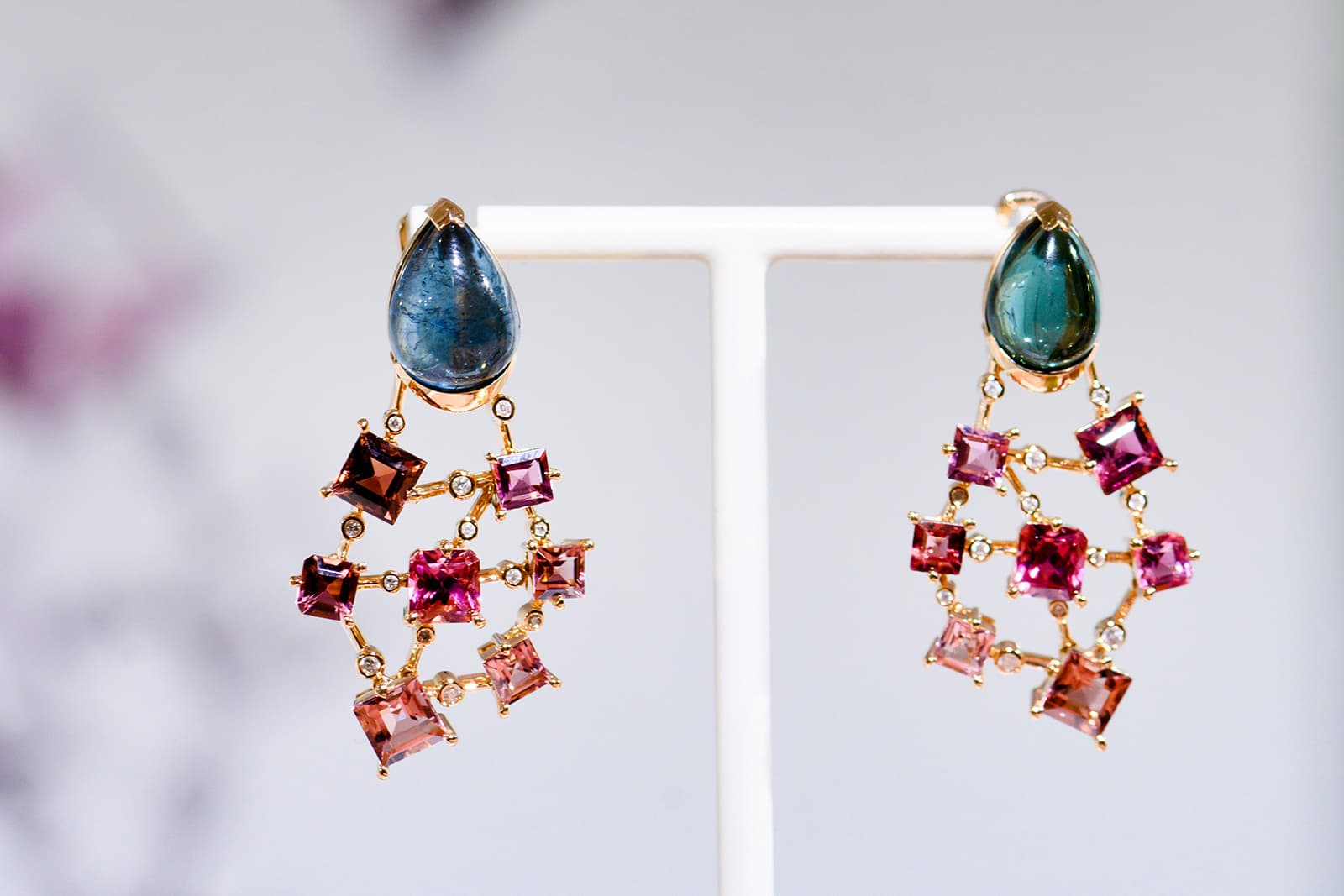 Nuun 'Tissu' earrings from the 'Manifesto' collection with 10.51ct green tourmalines, 10.32ct pink tourmalines and diamonds in yellow gold