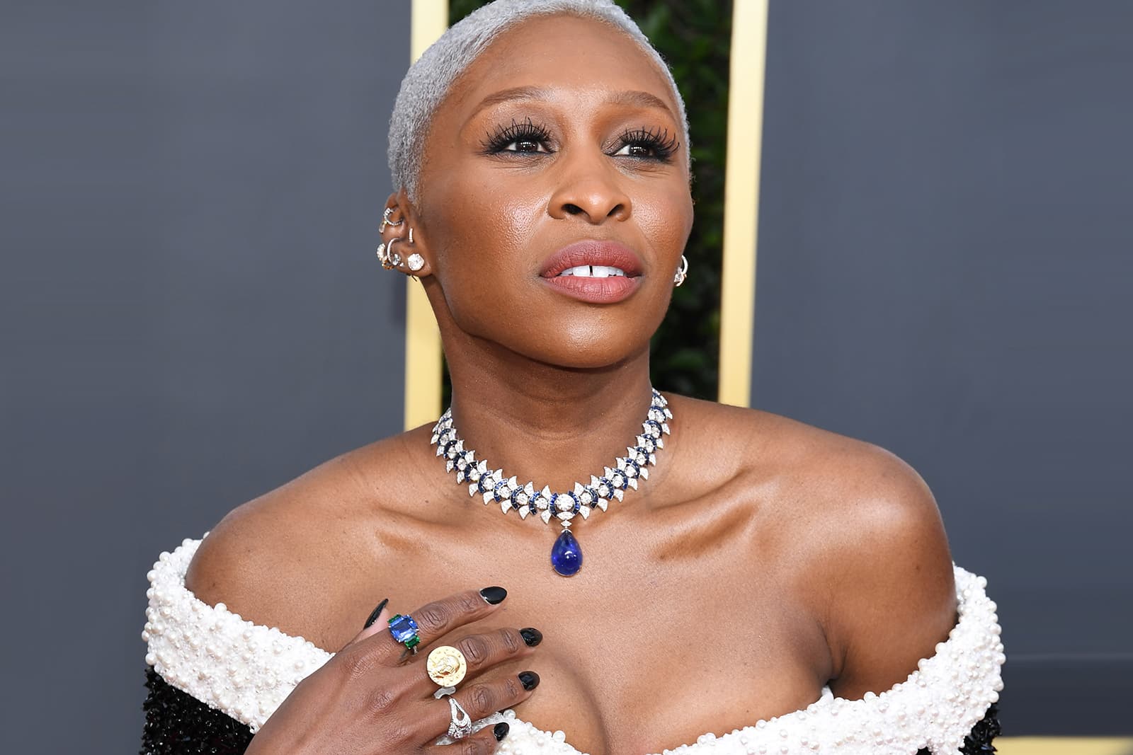 Cynthia Erivo wearing a Bulgari necklace with 40ct cabochon sapphire, and 56.65ct of accenting diamonds and sapphires, diamond earrings and a selection of rings