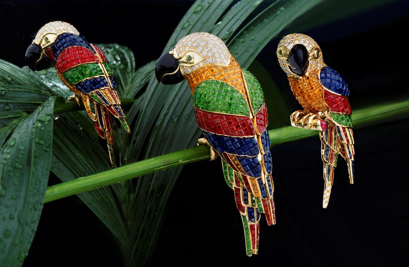 Vintage Stenzhorn The Parrots line with diamonds and enamel, and invisible set tsavorites, rubies, blue and orange sapphires in yellow gold