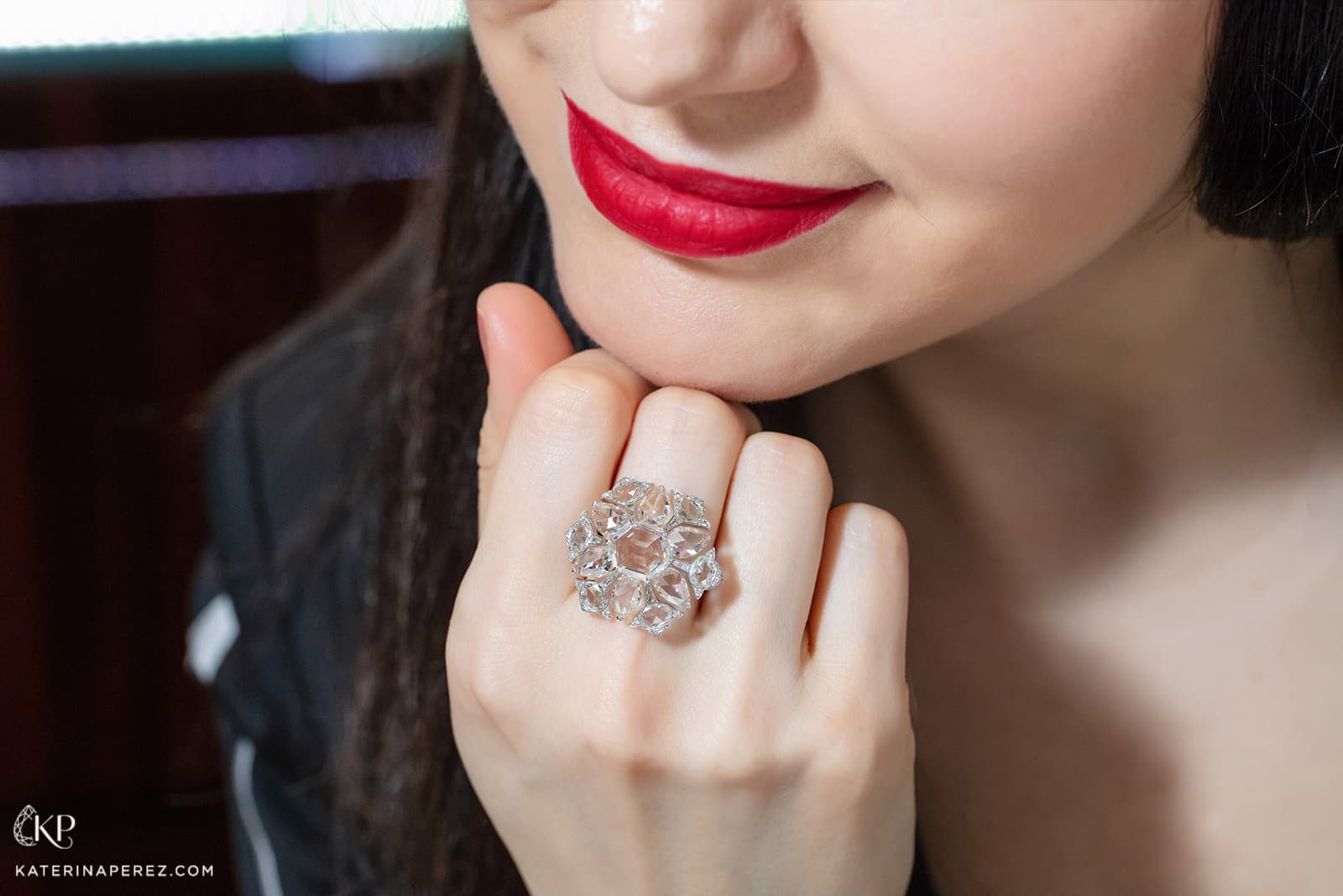 VAK ring with hexagonal cut G colour VS1 clarity diamond and accenting diamonds 