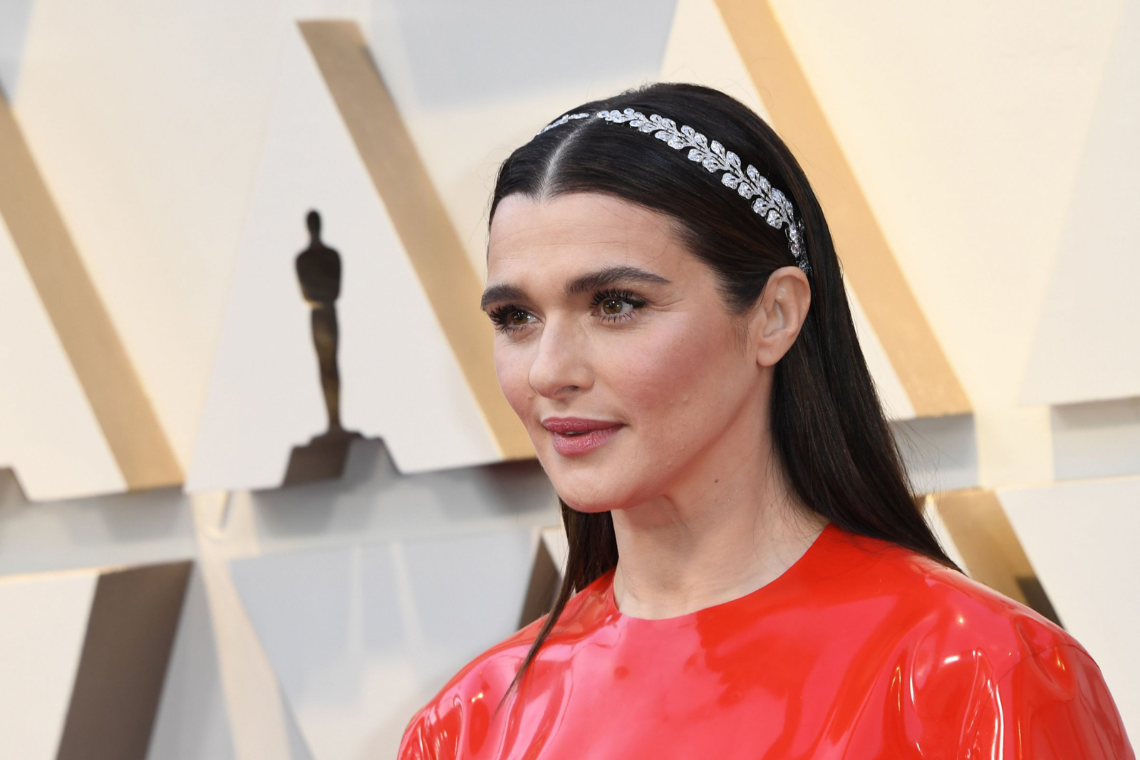 Rachel Weisz wearing Cartier Archive Collection antique laurel leaf style diamond and platinum brooches as a headband