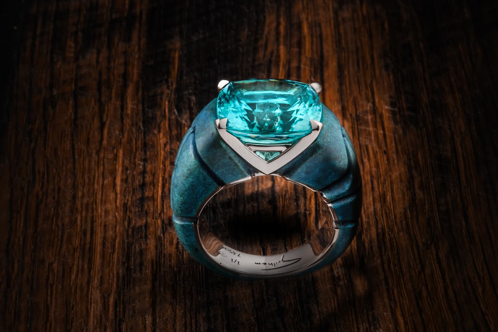 One of Philippe Guilhem's unique pieces featuring a remarkable Paraiba tourmaline set in bronze and platinum