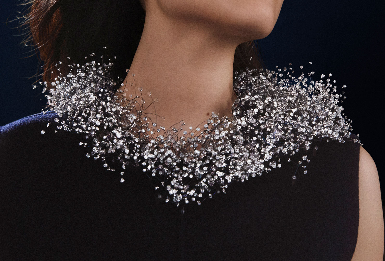 A total of 4,018 diamonds and miniature glass beads were strung on fine titanium threads to create the Nuage en Apesanteur high jewellery necklace