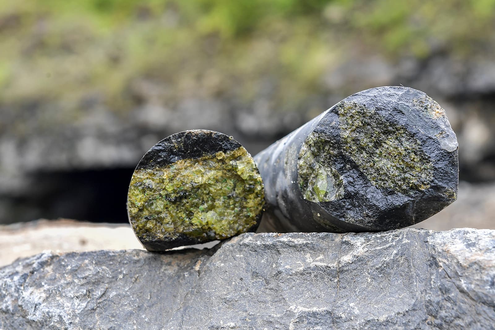 Core samples extracted from the mine reveal glimpses of precious peridot