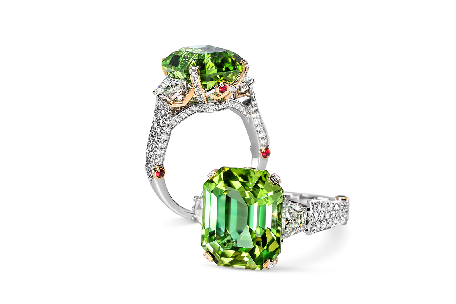 Madly ring set with an almost 10 carat neon mint tourmaline with red spinel accents 