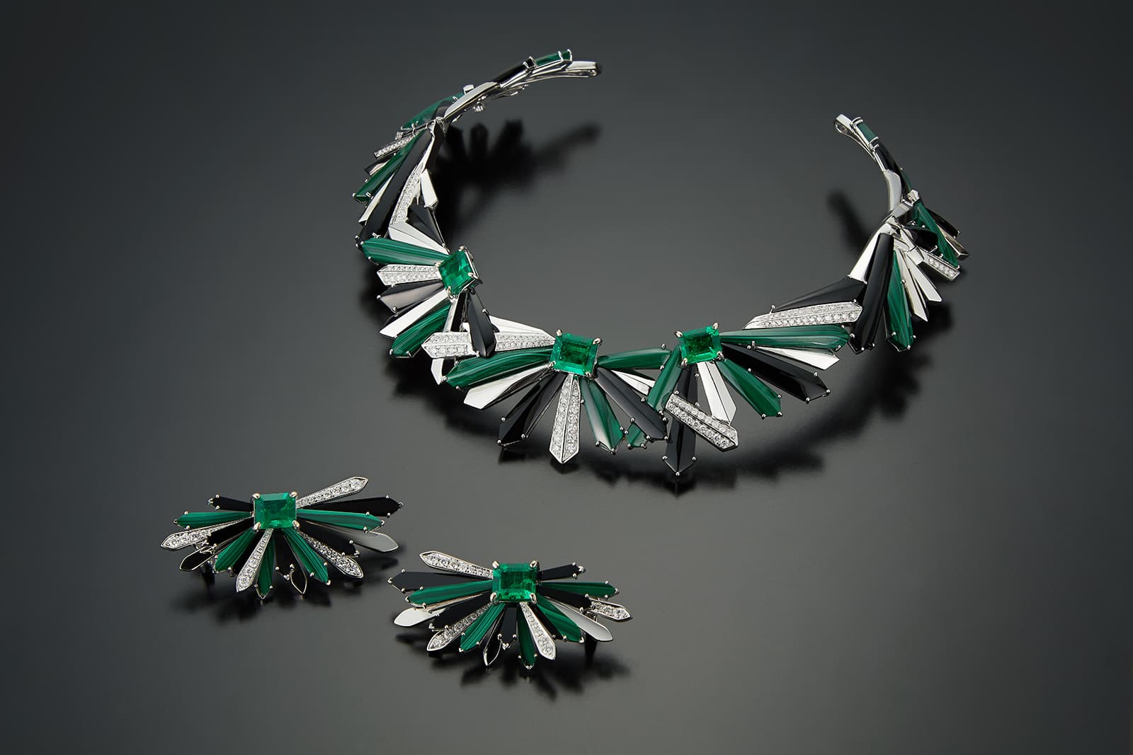 Colette Penacho necklace and earrings with 6.48 carats and 4.32 carats of Muzo emeralds, respectively, paired with malachite, onyx and diamonds in 18k white gold