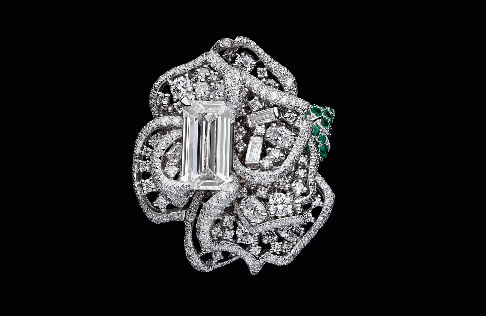 RoseDior ring in white gold with 3.29 cts emerald cut diamond, diamonds and emeralds