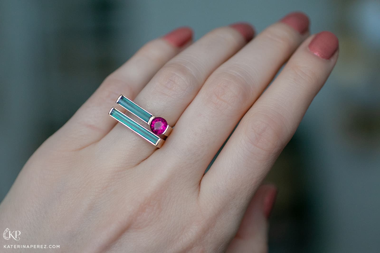 Maison Alix Dumas ring with two ‘needles’ of blue indicolite tourmaline crystal and a cut and polished rubellite tourmaline, set in Fairmined yellow gold