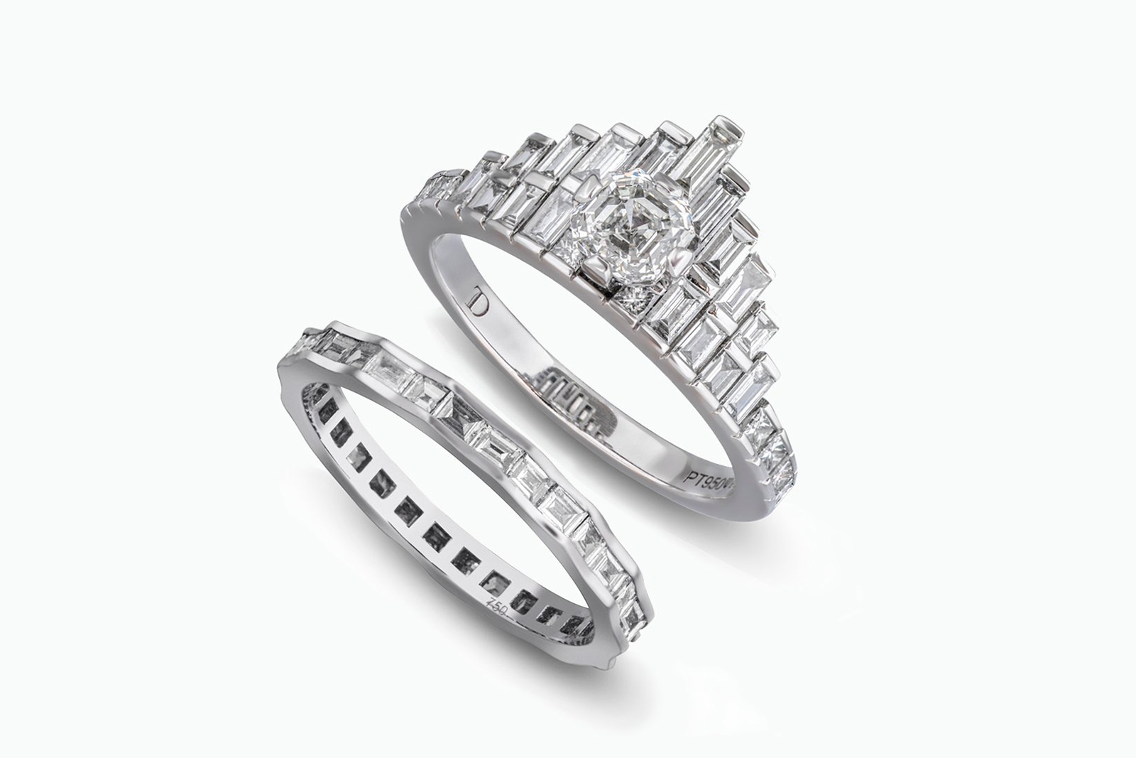 An engagement ring and matching wedding band with baguette-cut diamonds from The Moderne Bridal collection by Tomasz Donocik