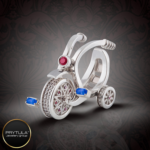 Prytula Bicycle ring with sapphitres, rubies and diamonds